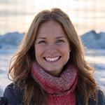 Smiling portrait of Kim Lee enjoying the Arctic